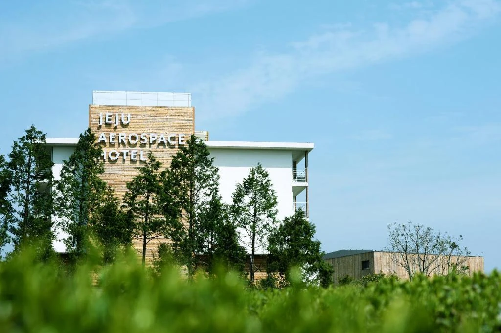 Jeju Aerospace Hotel exterior beside the green-tea fields in Andeok