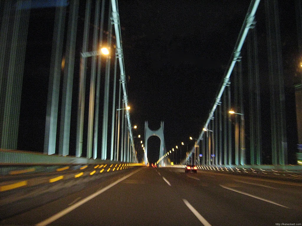 Gwangan Bridge illuminated at night in Busan, showing why room direction and viewing angle matter in Gwangalli