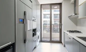 Full kitchen and laundry facilities at Somerset Jeju Shinhwa World
