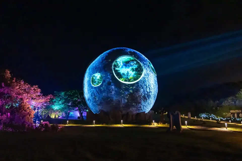 Real nighttime venue scene on Trip.com exact Lunafall attraction 142405079