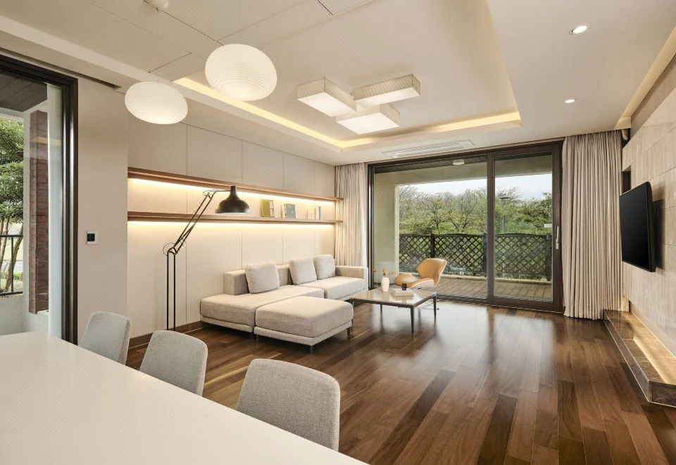 Family Suite living room at Somerset Jeju Shinhwa World