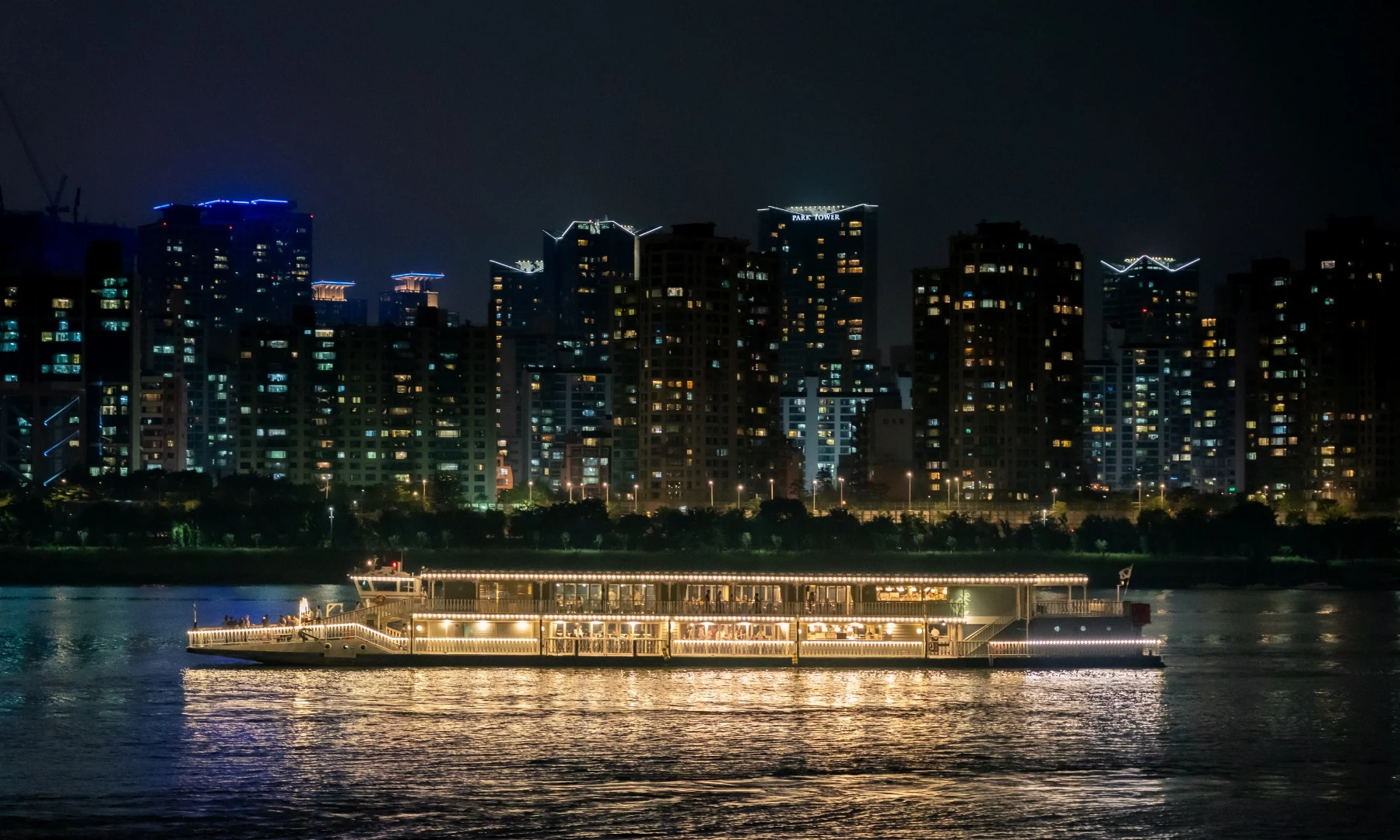 Eland Han River cruise sailing through the Seoul night skyline from Yeouido