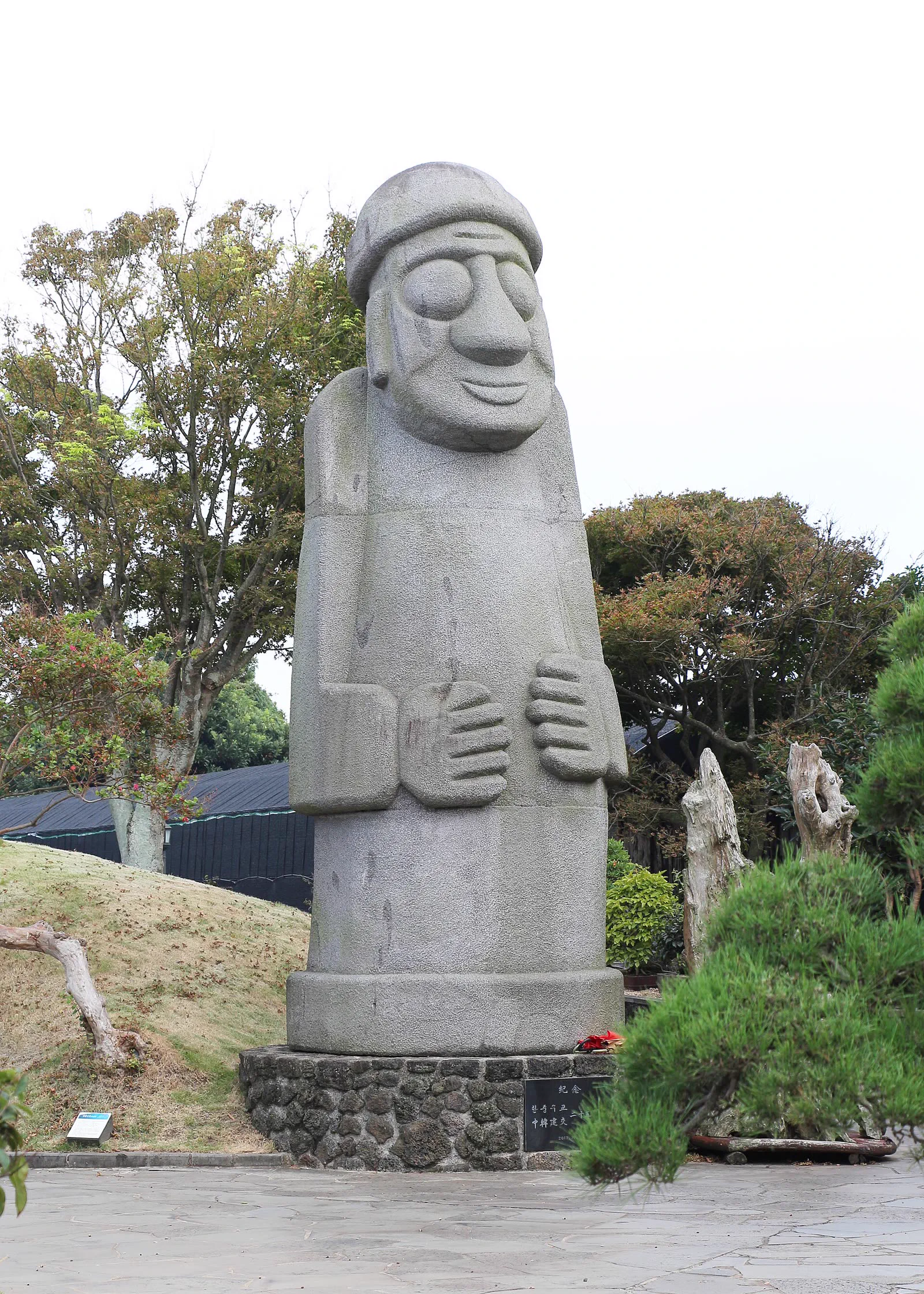 Stone sculptures and landscaped plantings inside Spirited Garden Jeju