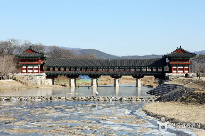 Daylight view of Woljeonggyo Bridge and the stepping stones across Namcheon