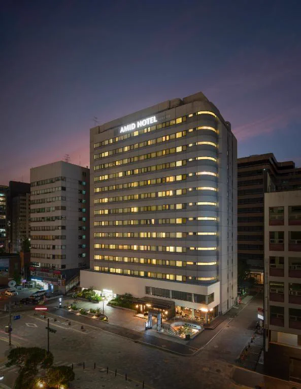 Exterior of AMID Hotel Seoul with the hotel sign visible