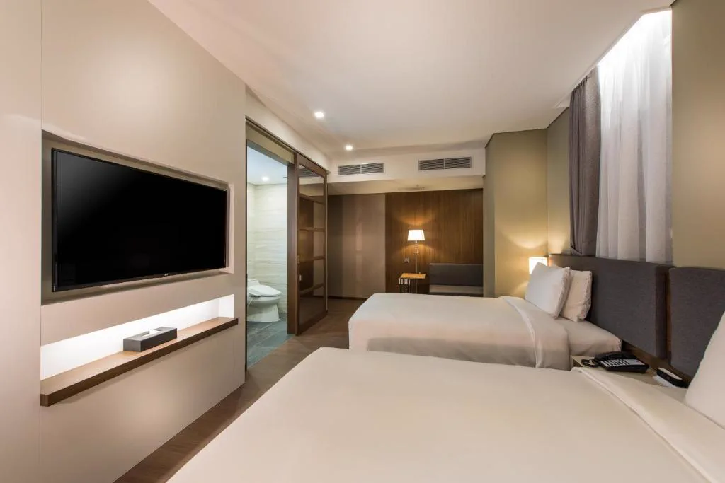 ENA Suite twin-room detail.