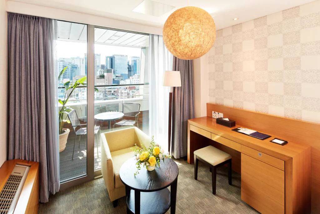 Hotel PJ Myeongdong guest room with balcony