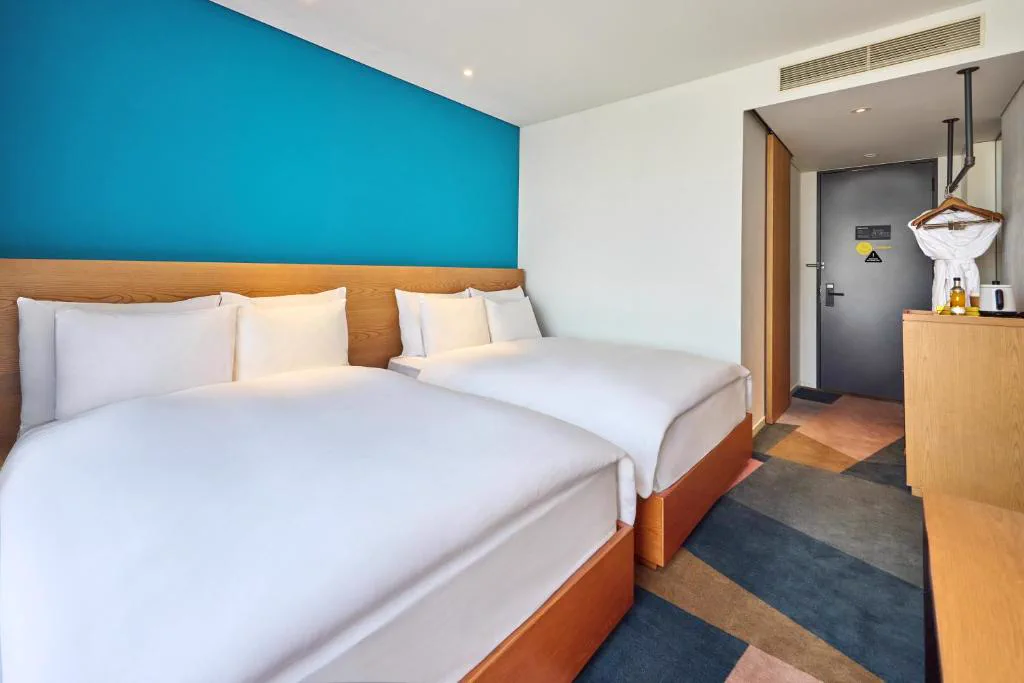 Interior of a twin room at L7 Hongdae