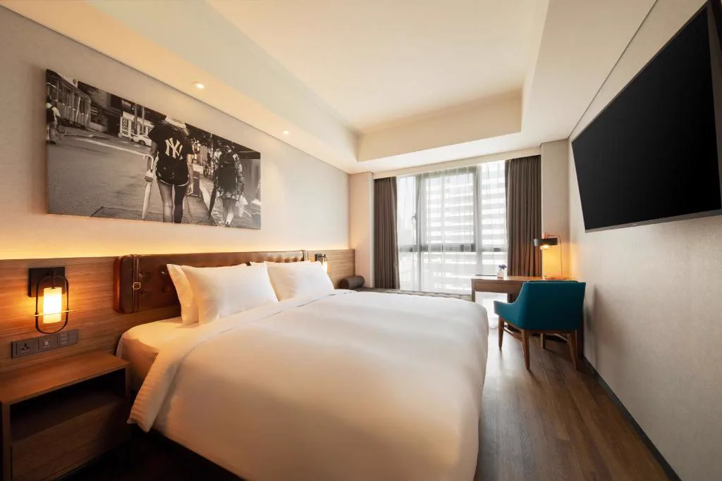 Bed setup inside a guest room at Mercure Ambassador Seoul Hongdae