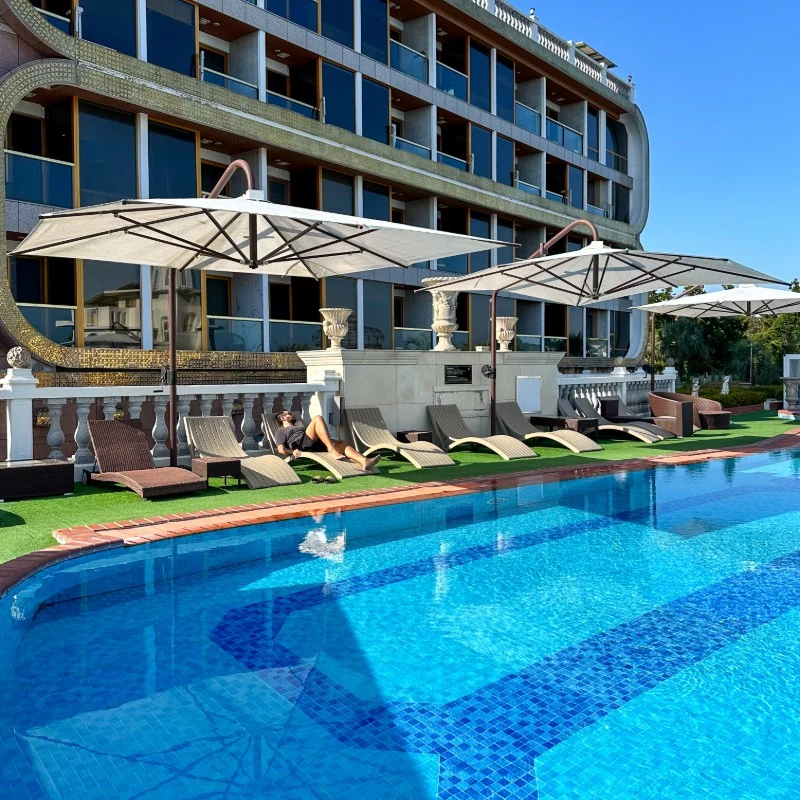 GoldOne Hotel and Suites Jeju exterior and heated infinity pool
