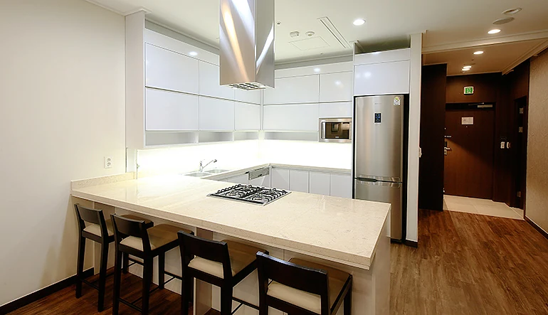 Kitchen and dining counter in a Seoul serviced apartment
