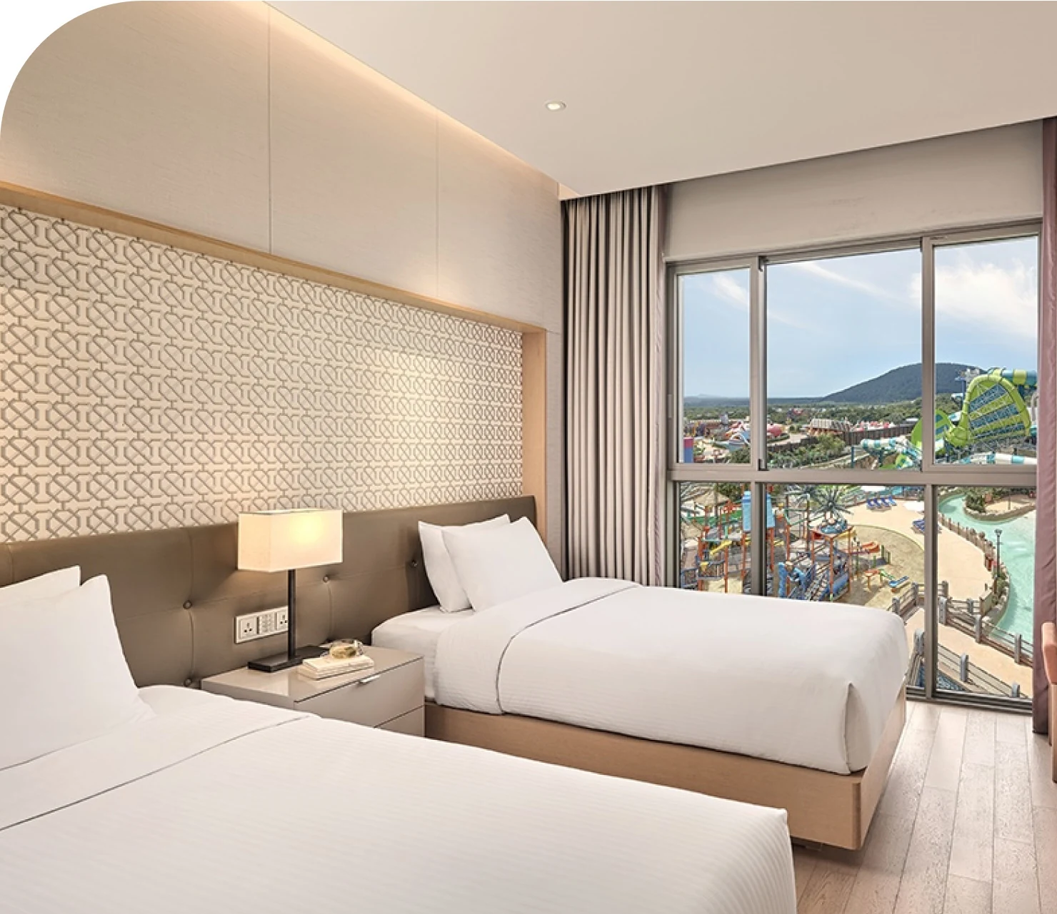 Guest room overlooking a water park at Jeju Shinhwa World