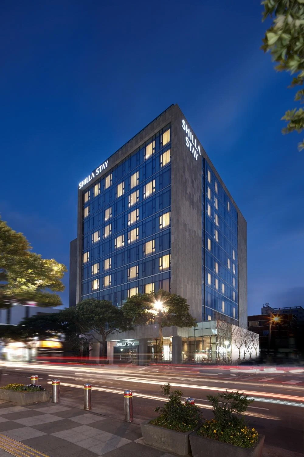 Shilla Stay Jeju building at night in Yeondong