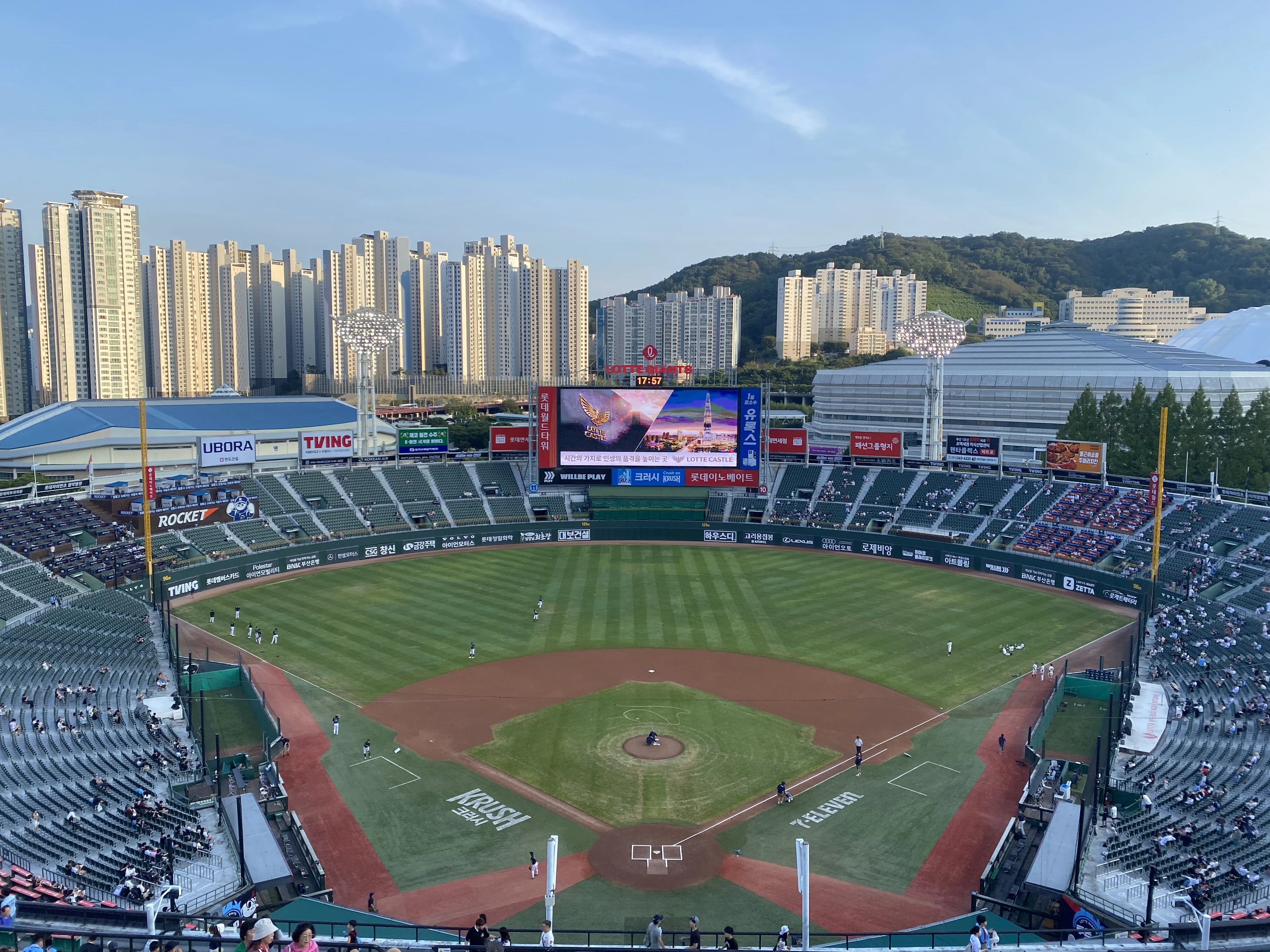 View across the field inside Sajik Baseball Stadium in Busan from the upper seating area