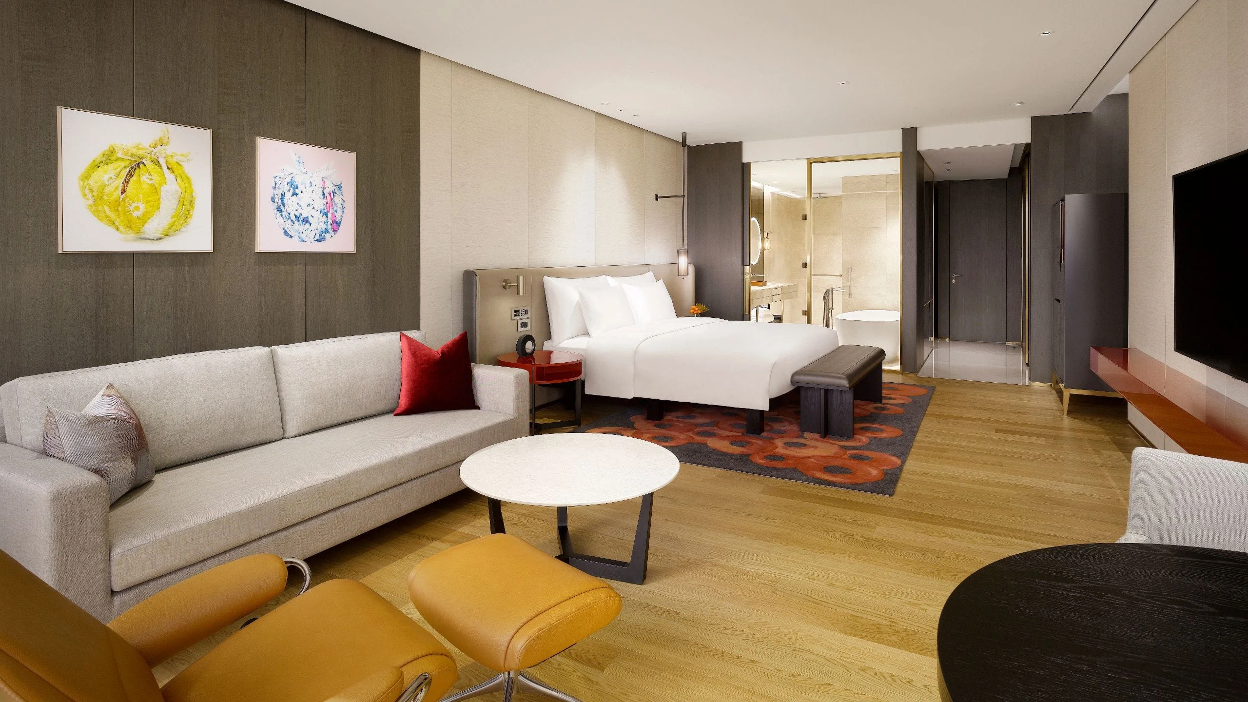 Hotel room with a bed and separate sitting area